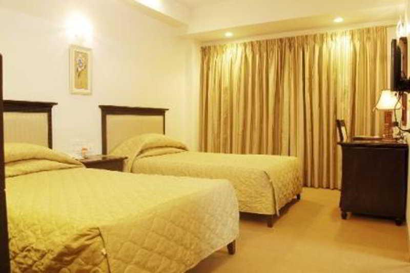 Hotel Mandakini Ambience Pune Oda fotoğraf